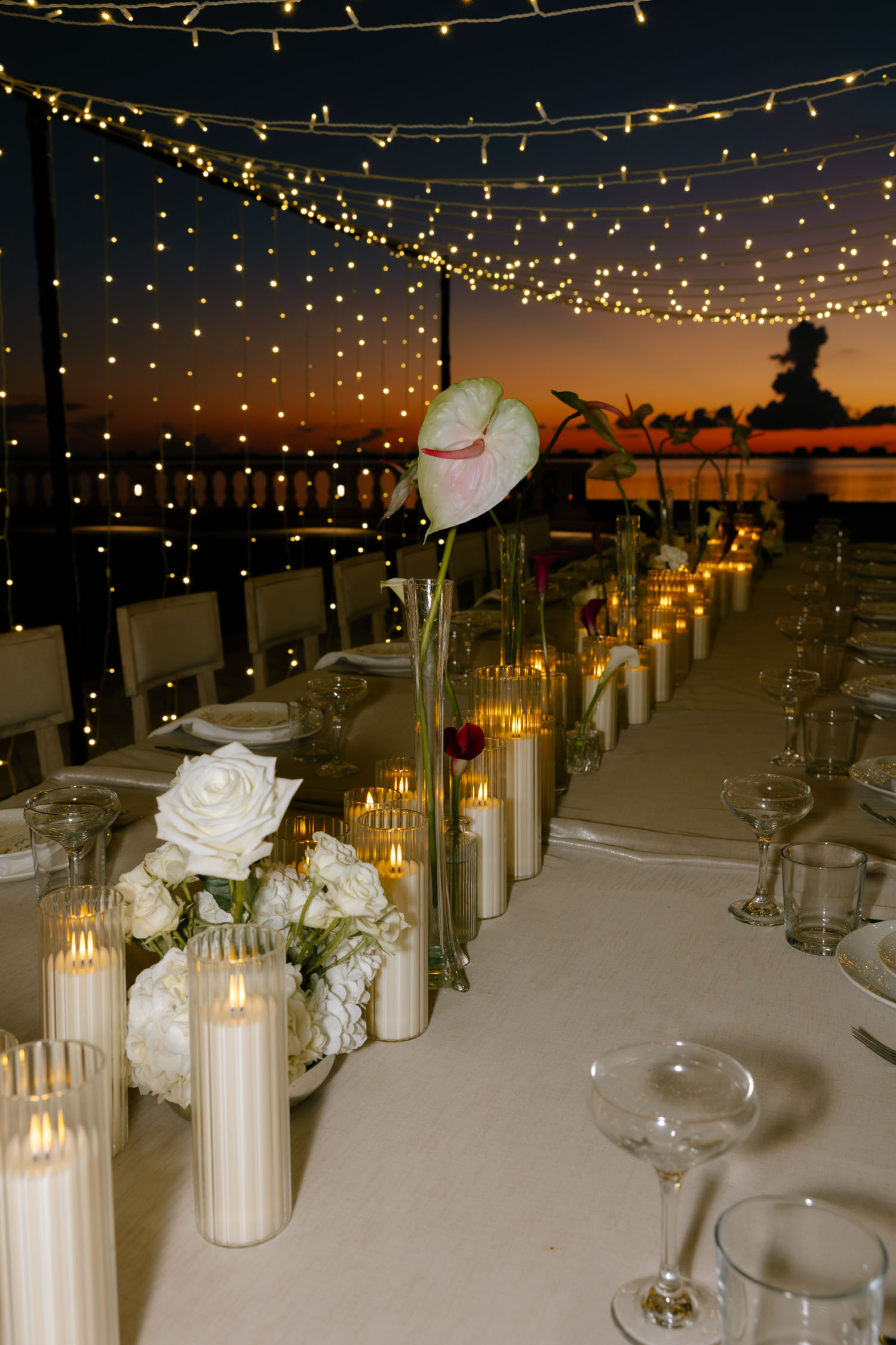 Romantic orange sunset reception decor photos overlooking the Gulf Coast in Sarasota, Florida